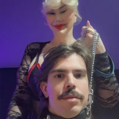 Beautiful Mistress With Submissive Slave